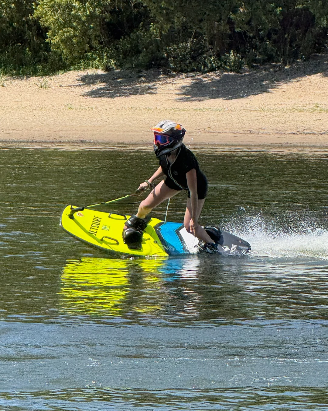 Rider on a JETSURF board during an experience on the private lake in Wöbbelin.